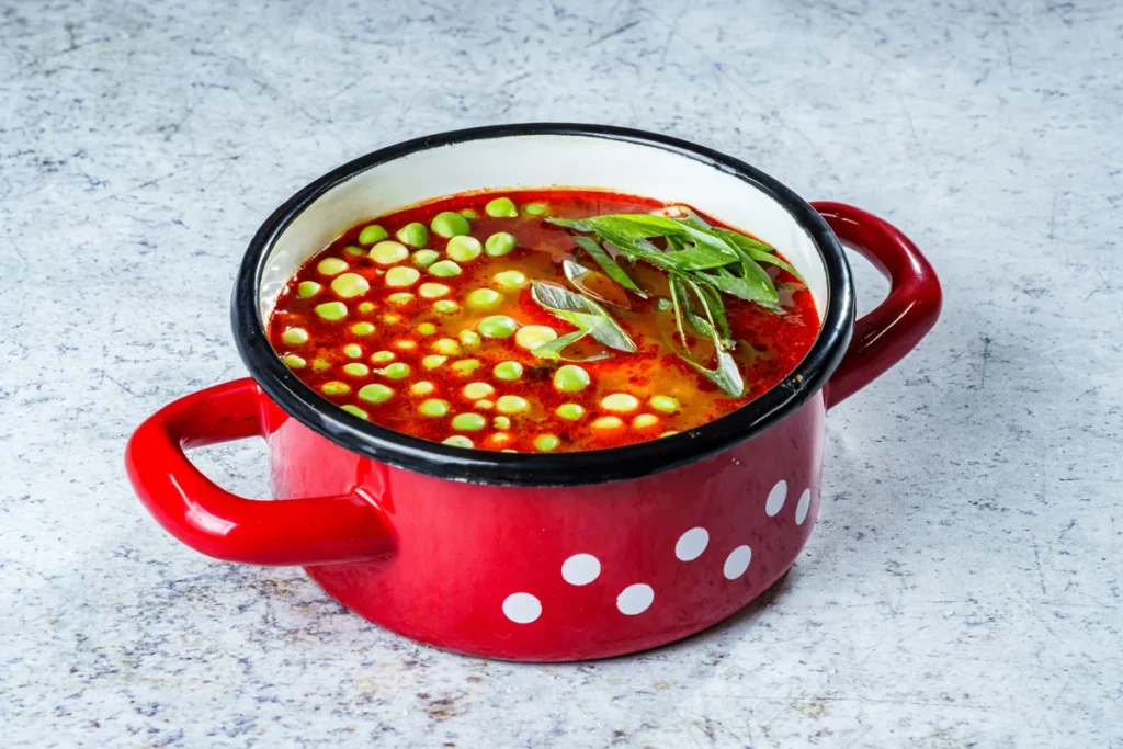 Hungarian pea soup with cauliflower dumplings and vegetables