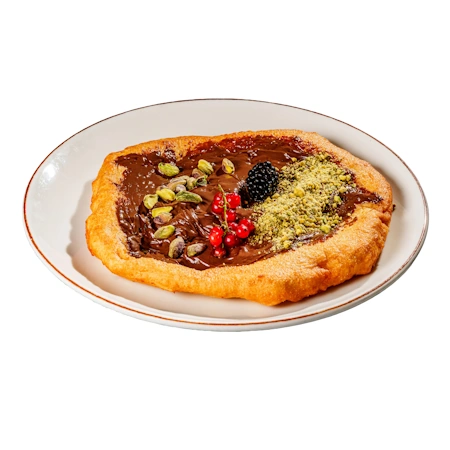 Langosh with Nutella and pistachio